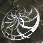  Le relax a la turbine 
Sculpture réalisé par Denis Poirier et Hans Barzeele, 2005-2007.
Acier Inoxydable, 
Ensemble en trois partie, chaise qui n’est pas une chaise et d’une table qui n’est pas une table, agencer d’une roue suspendu, la turbine. 
15000$
